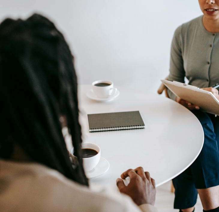 Benefits of ADHD assessments Client and therapist talking at a table